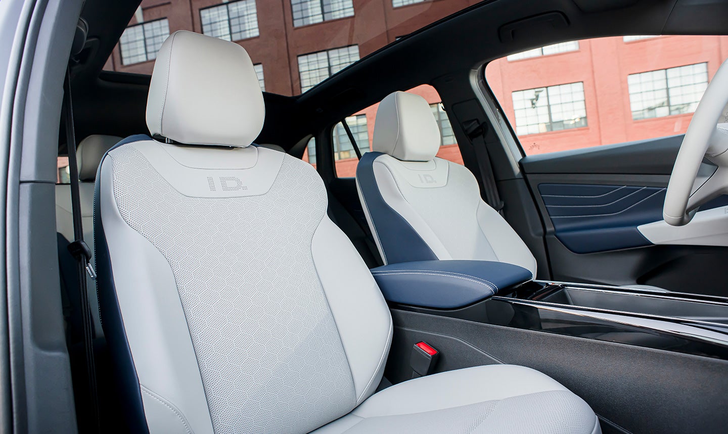 A close-up shot of the ID.4 Cosmic interior cockpit area with a focus on showing the front seating surfaces.